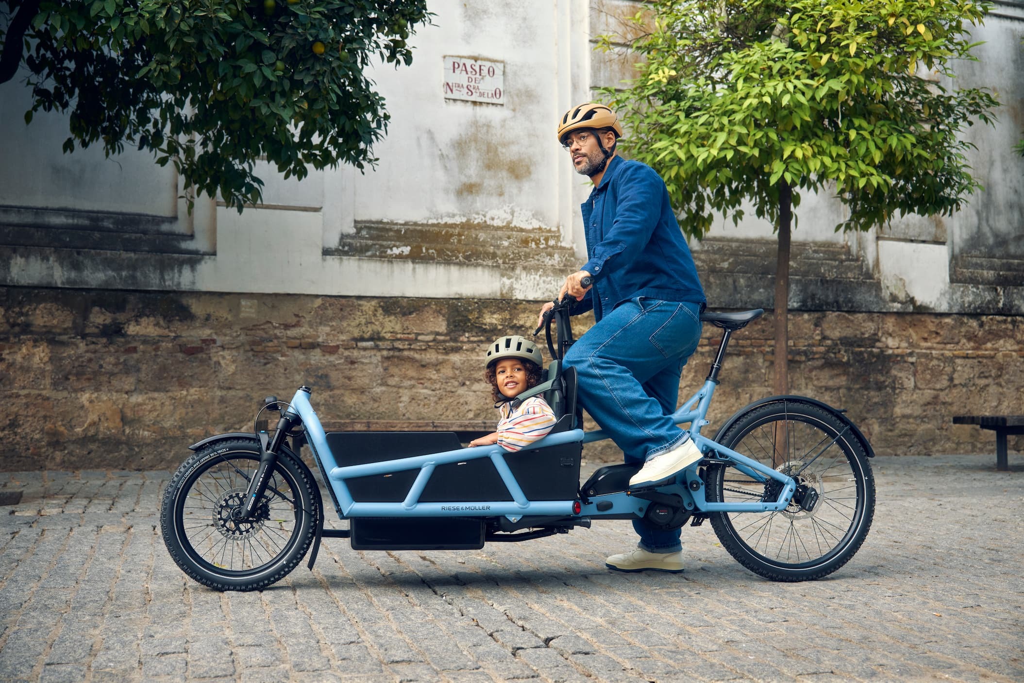 Family riding a Riese & Müller cargo e-bike